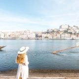 A girl against the backdrop of a picturesque coastline in Portugal